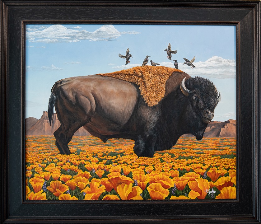 bull bison stands in a field of yellow poppies. cowbirds are flying around his shoulders.